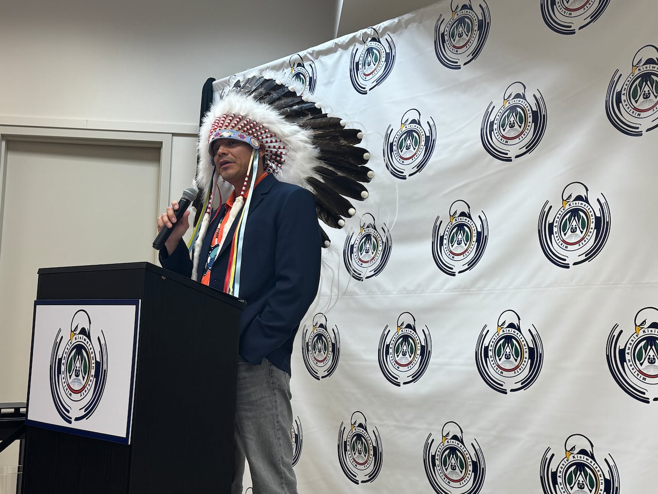 Chief speaks at a podium